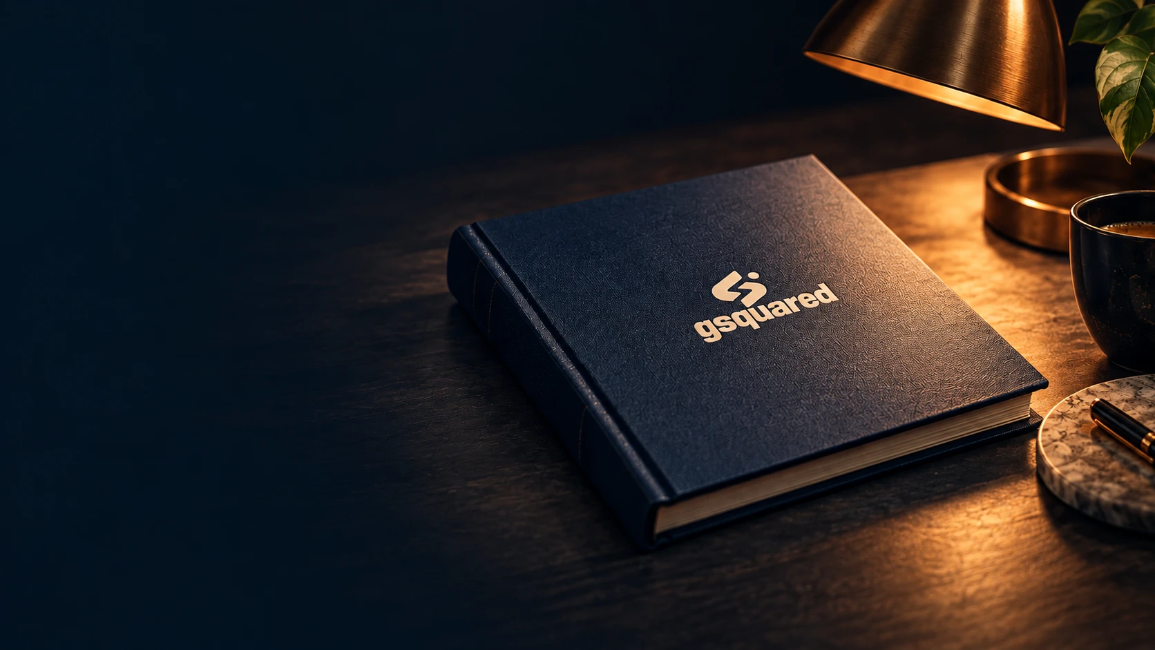 GSquared launch-review binder on a desk.